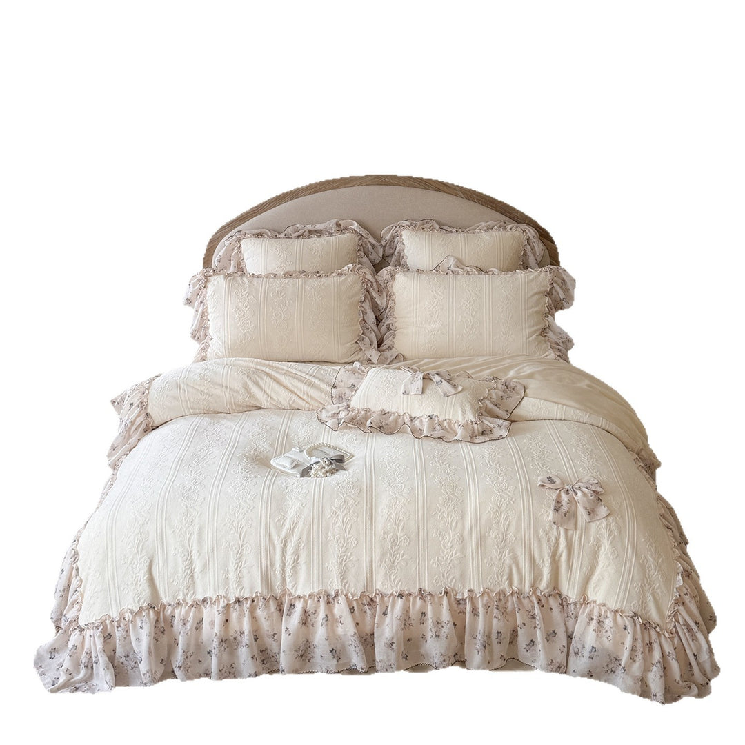 Romantic cotton bedding set with jacquard structure, ruffles and bow trim