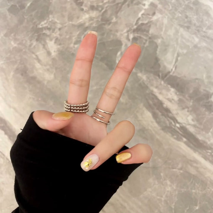 Elegant Press-On Nail Art Set with Gold Accents