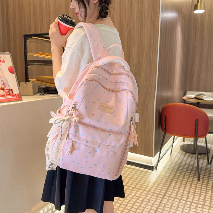 Stylish Multi-Pocket Backpack with Decorative Accents Kalsten