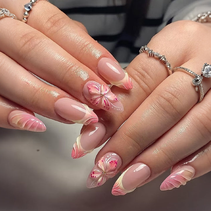 Artificial nail set with delicate floral designs and modern ombre effects Kalsten