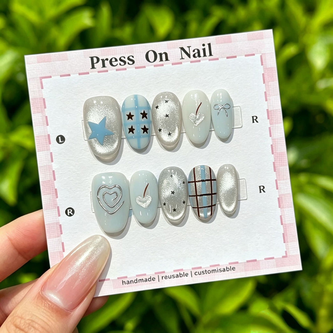 Artistic Press-On Nails with Decorative Elements