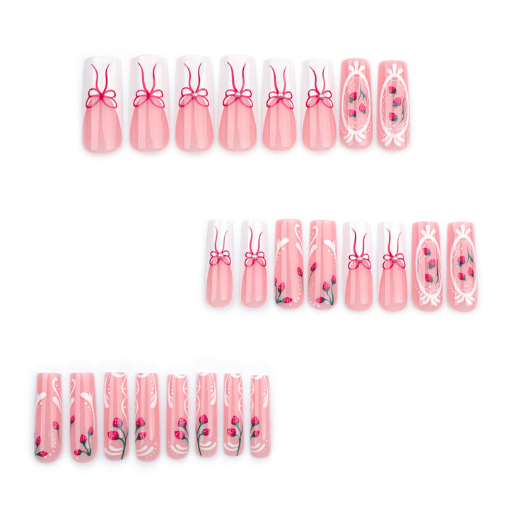 Artful nails with strawberry motifs and bow accents Kalsten