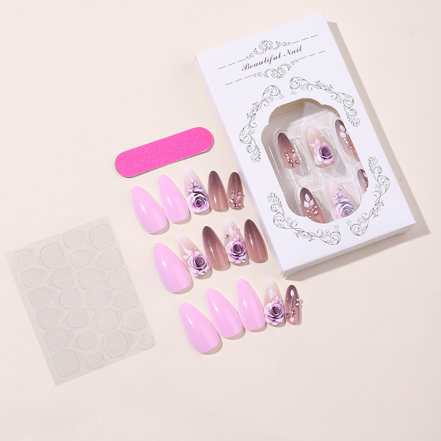 Creative nail art set with elegant rose accents and soft color gradient Kalsten