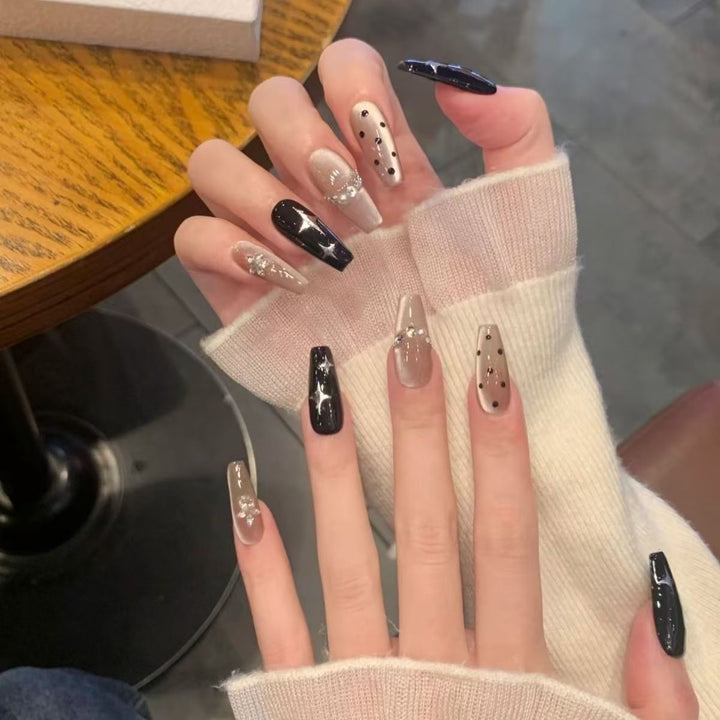 Stylish Press-On Nail Extensions with Decorative Accents