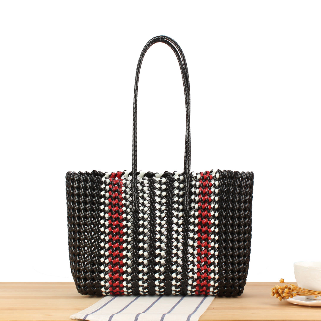 Tote bag made of sturdy woven material with stylish colored accents Kalsten