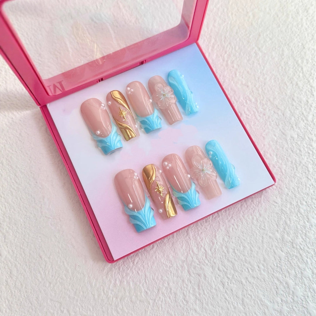 Artistic Press-On Nail Set with Floral and Gold Accents