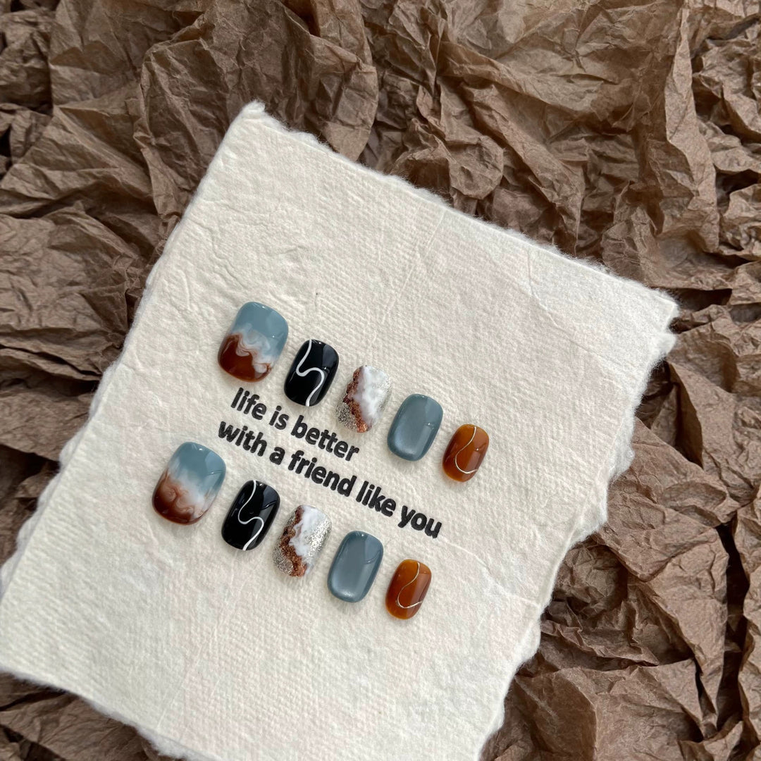 Artistic Press-On Nail Set with Stunning Marble Effect