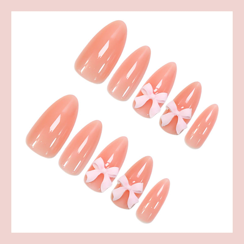 Artificial nail set with delicate bow embellishments Kalsten
