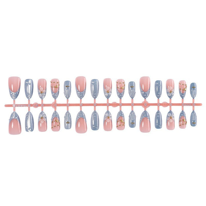 Creative acrylic nail set with elegant flower and glitter accents Kalsten