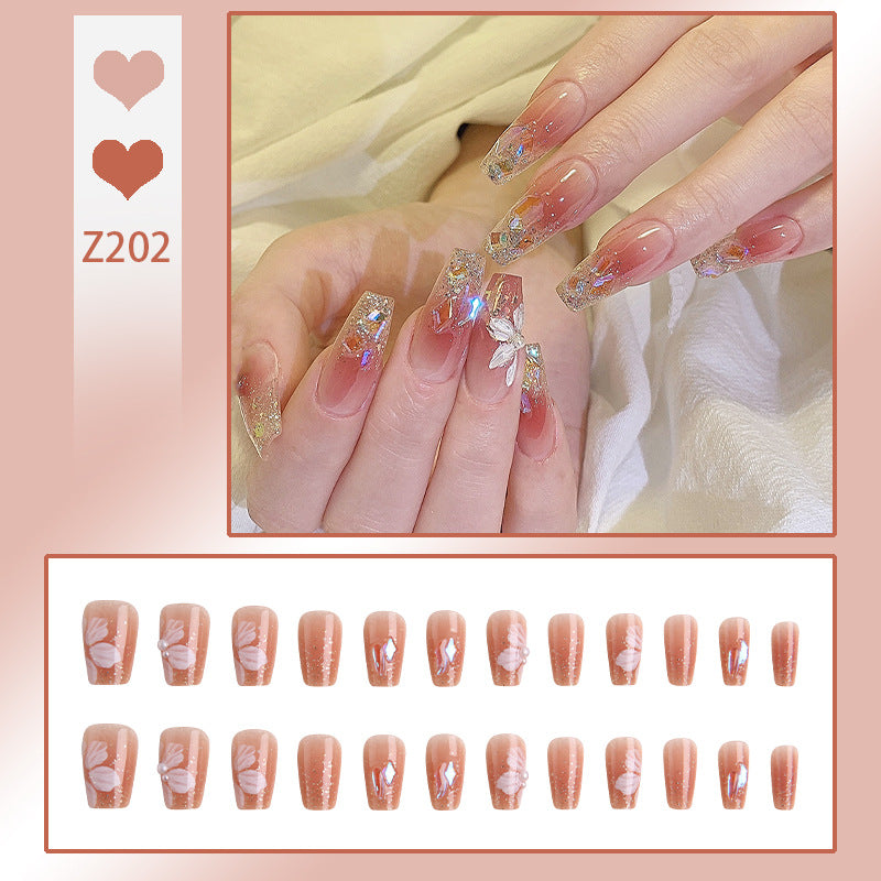Artificial nail set with floral and glittering accents Kalsten