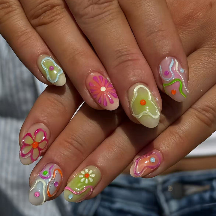 Artificial nails in the creative flower and foil design Kalsten