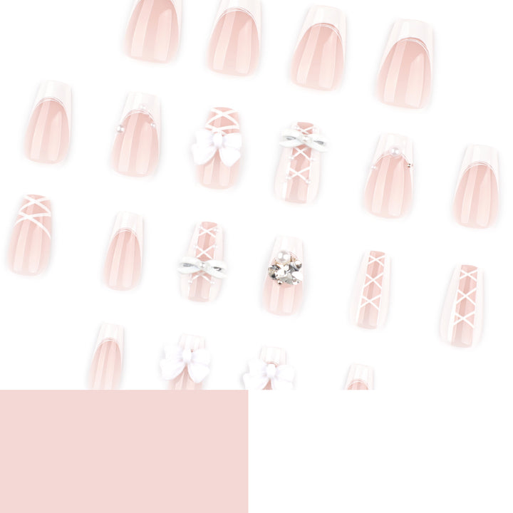 Artful Nail Art with Bows and Rhinestone Decorations Kalsten