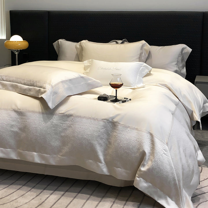 Premium cotton satin bedding set with structured matelassé border and hotel closure