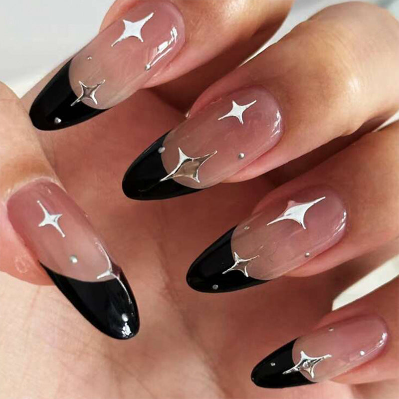 Elegant stiletto artificial nails with glitter accents Kalsten