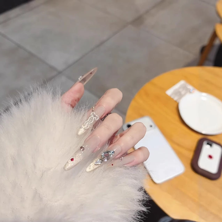 Artistic Crystal-Embellished Stiletto Nail Extensions