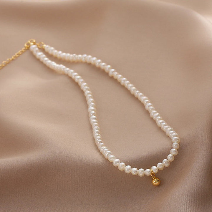 Delicate pearl necklace with elegant gold accent chain Kalsten