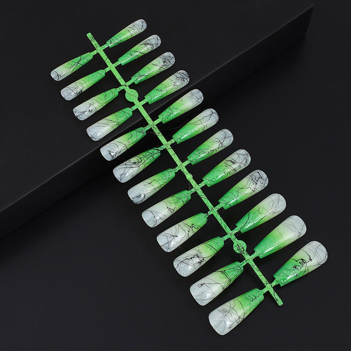 Artificial nails in modern ombre design with marbled accents Kalsten