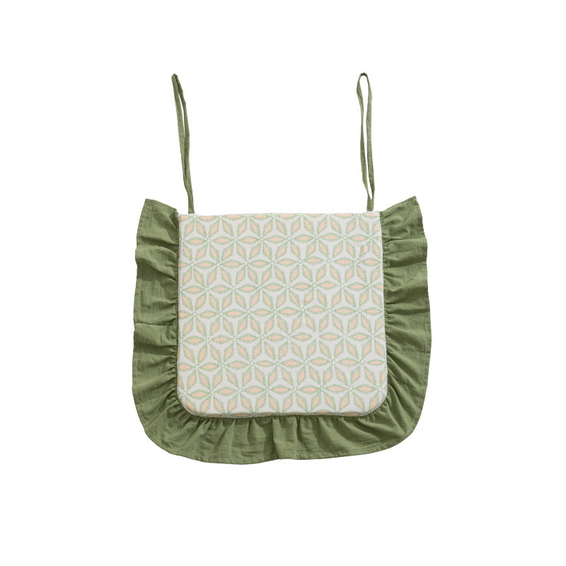 Padded chair seat cushion with tie straps and ruffled edge
