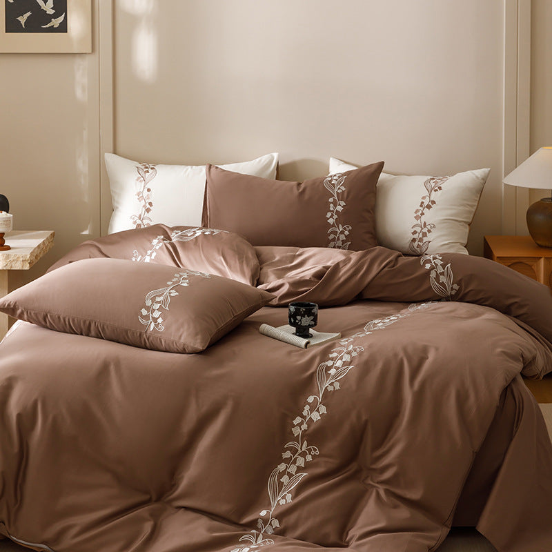 Embroidered bedding set made of cotton satin with floral vine embroidery
