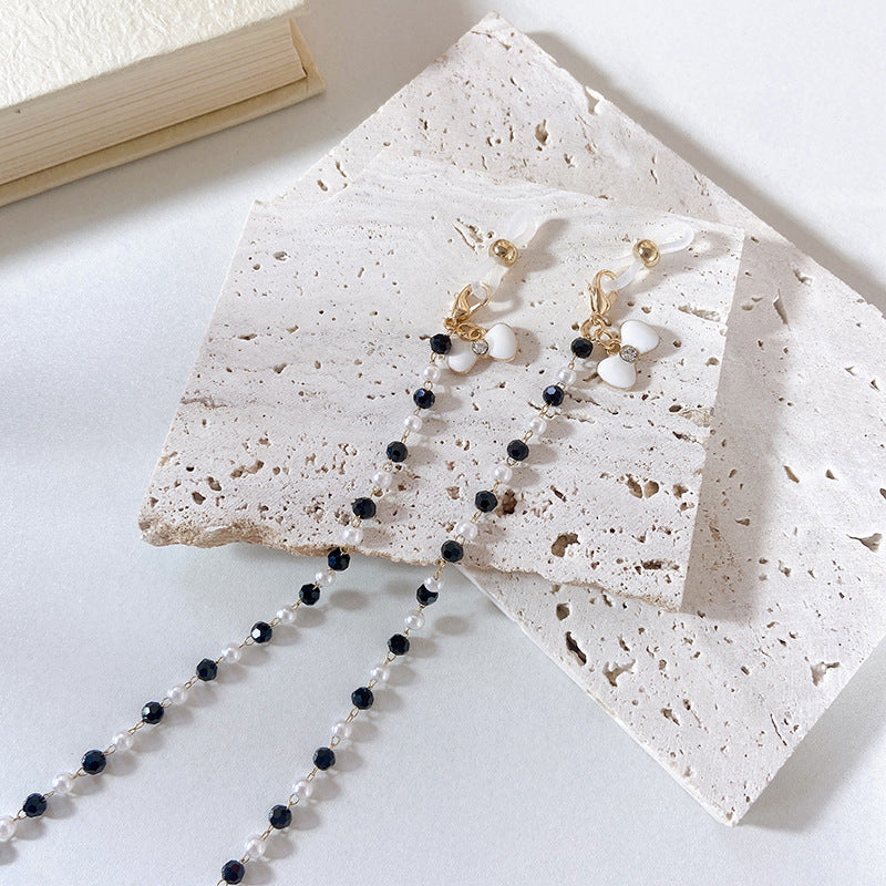Elegant earrings with pearls and flower pendants Kalsten
