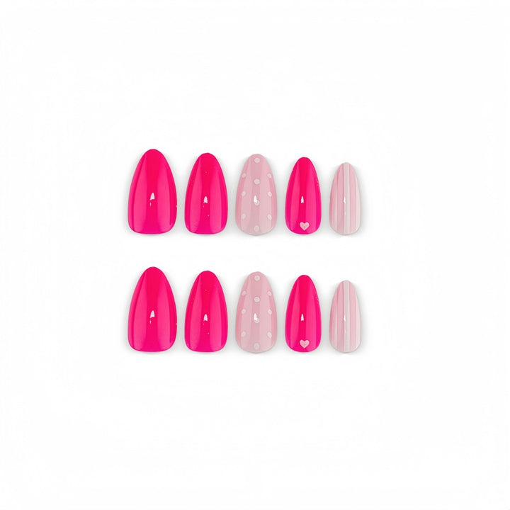 Artificial nails in playful design with hearts and dots Kalsten