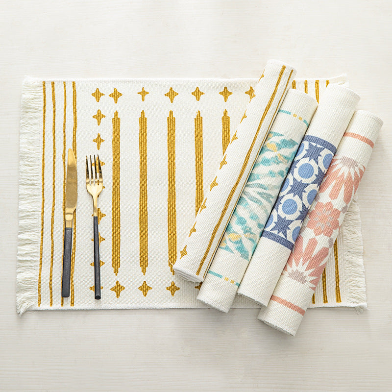 Woven rectangular table set made of cotton blend with central diamond band