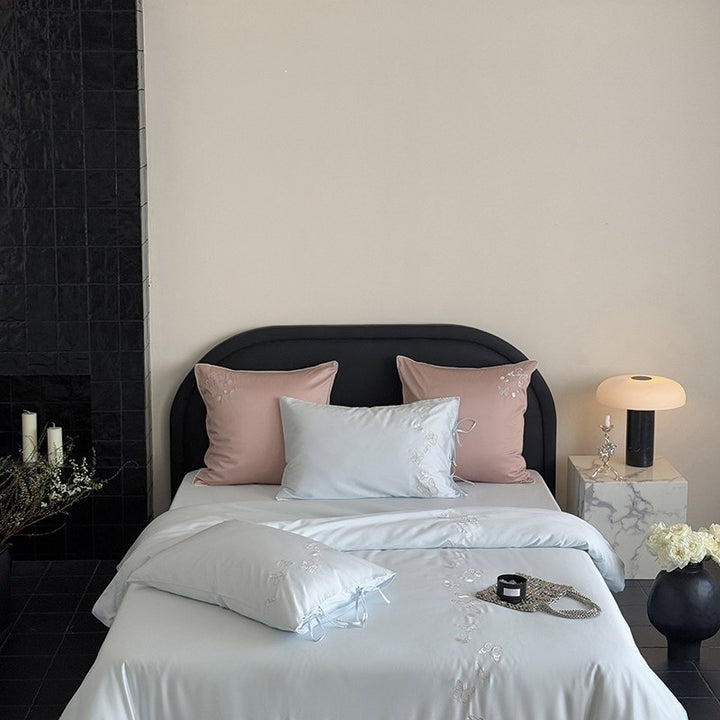 Luxurious cotton satin bedding set with butterfly embroidery and tie band pillow