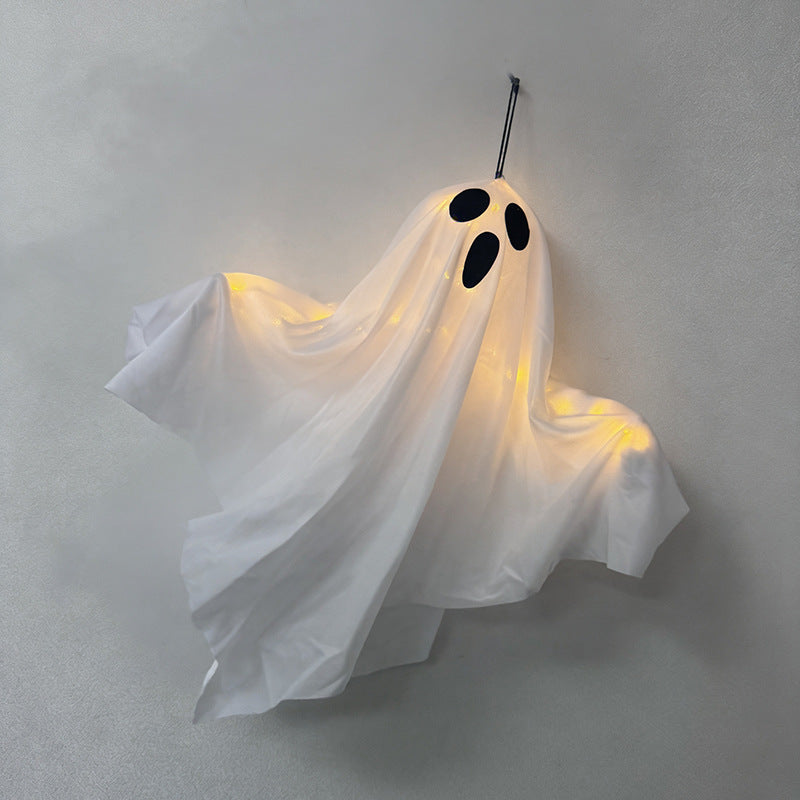 Hanging ghost decoration made of fabric with integrated LED string lights