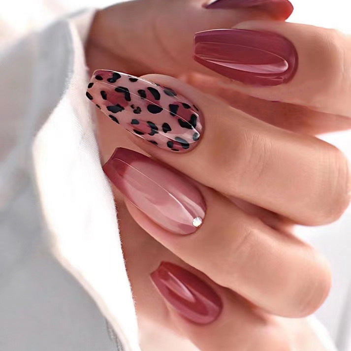 Artificial nail art with elegant leopard patterns Kalsten