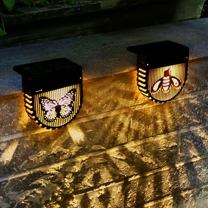 Decorative Solar-Powered Outdoor Wall Lanterns With Laser-Cut Insect And Floral Panels And Warm LED Ambiance Kalsten