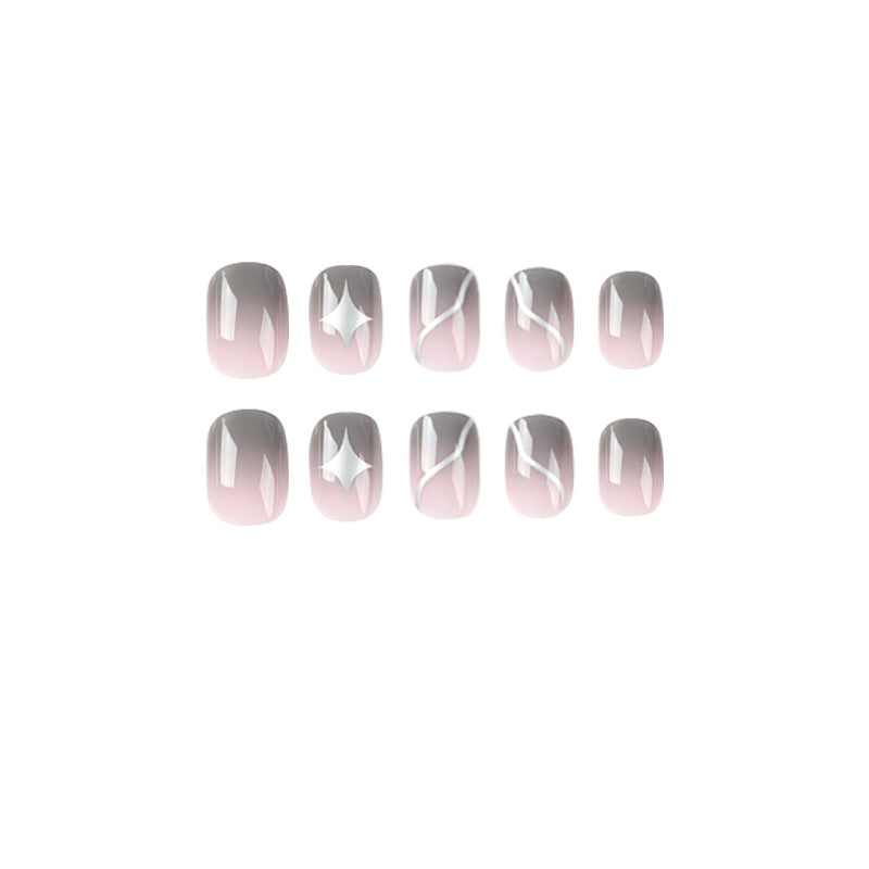 Artificial nail art with elegant ombre design and charming accents Kalsten