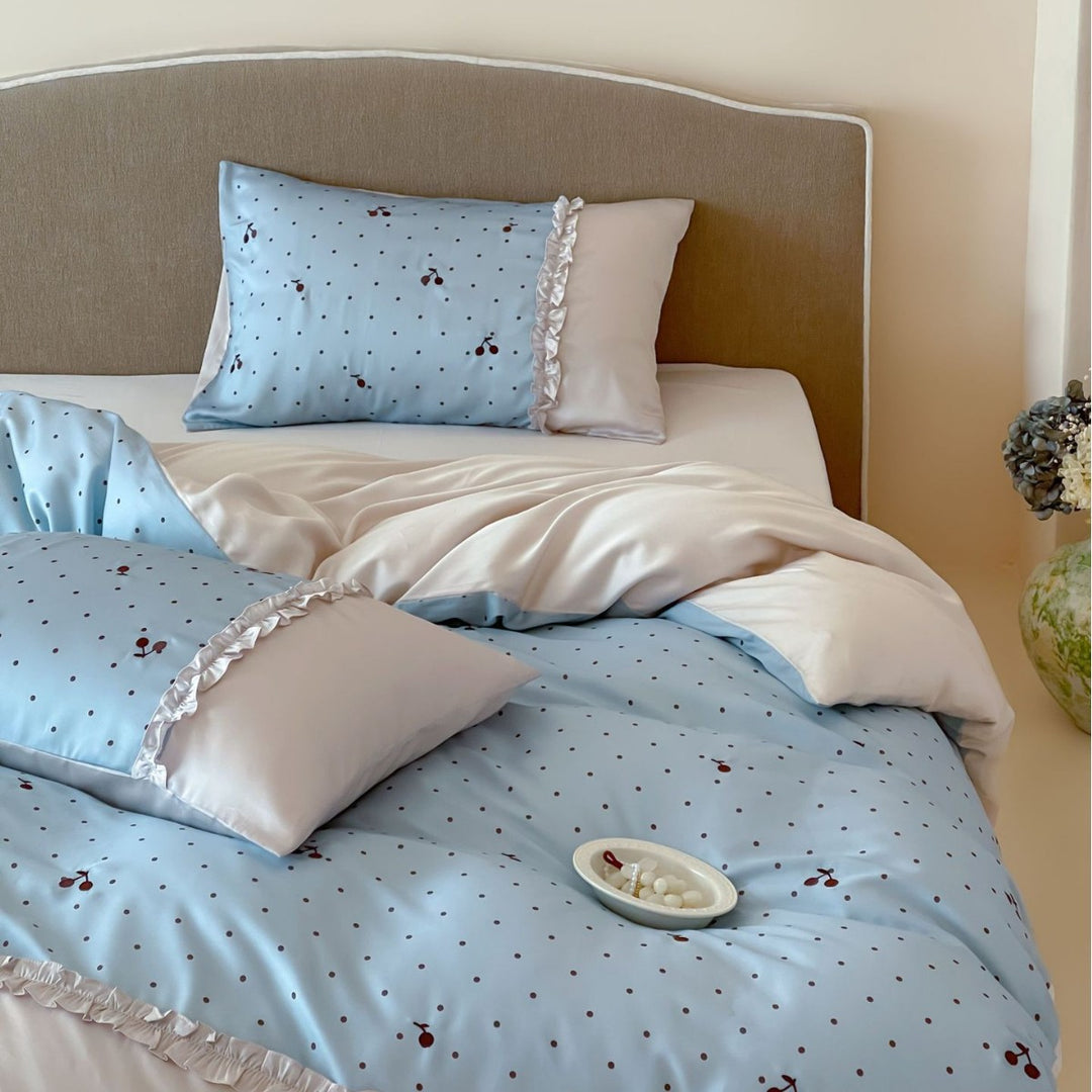 Satin bedding set with delicate ruffles and cherry pattern