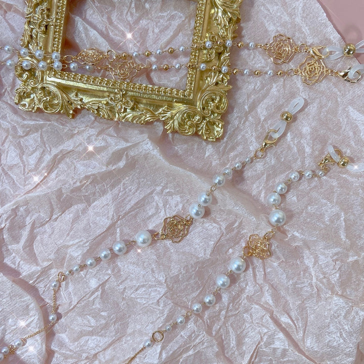 Sparkling glasses holder chain with pearls and floral pendants Kalsten