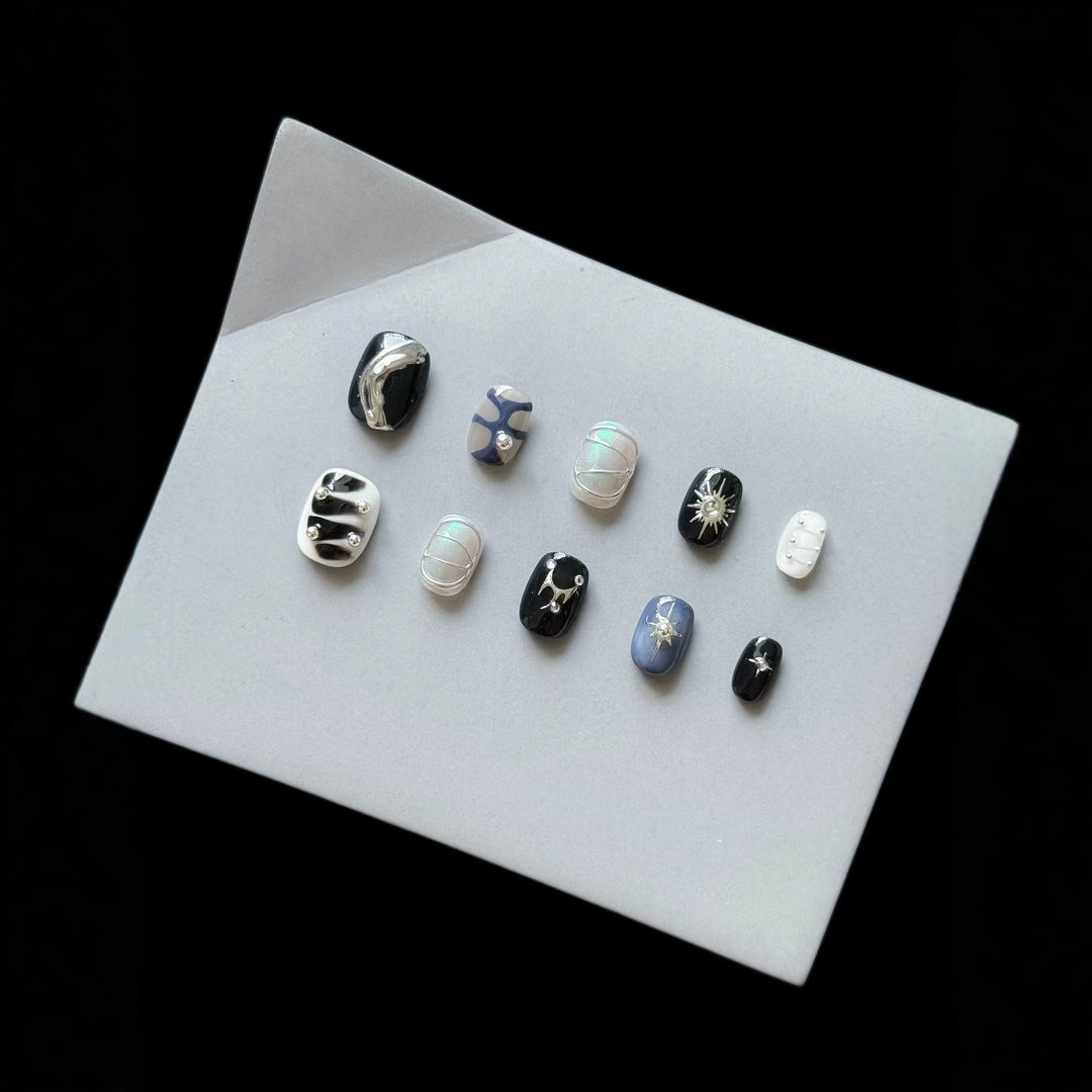 Artistic Press-On Nail Set with Cosmic Themes