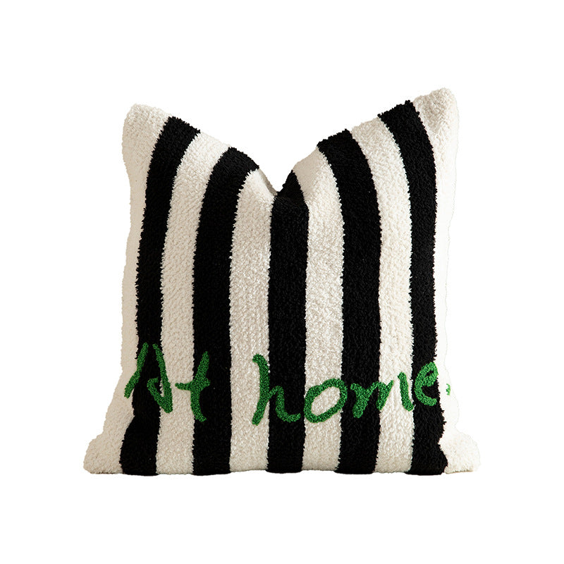 Striped bouclé decorative pillow with embroidered lettering and cuddly filling