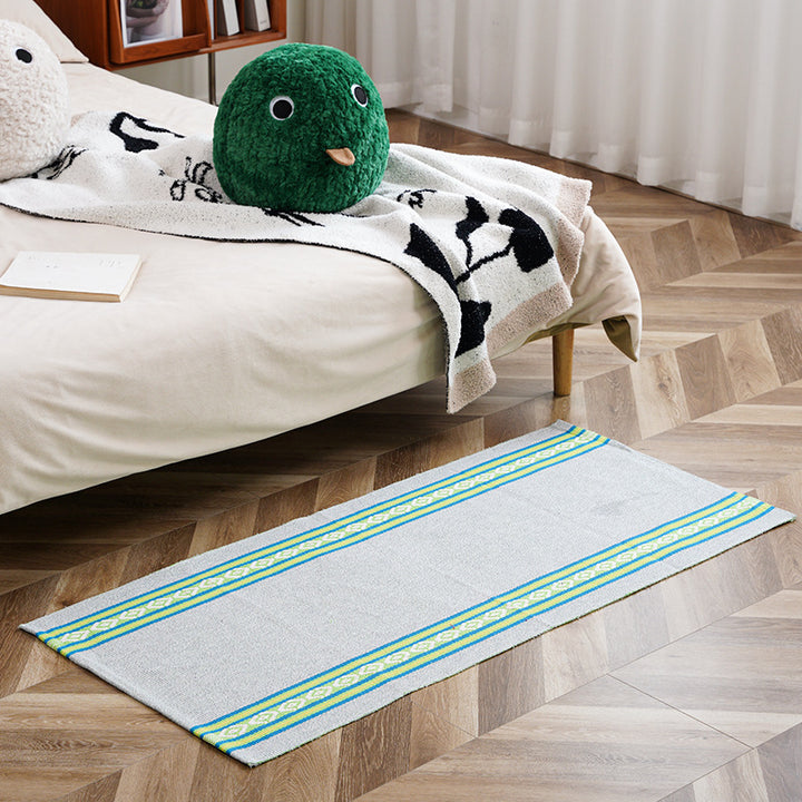 woven living room runner with fringes and geometric weave pattern