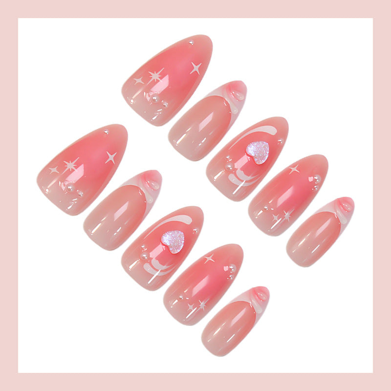 Acrylic nail set with romantic heart design and glitter accents Kalsten