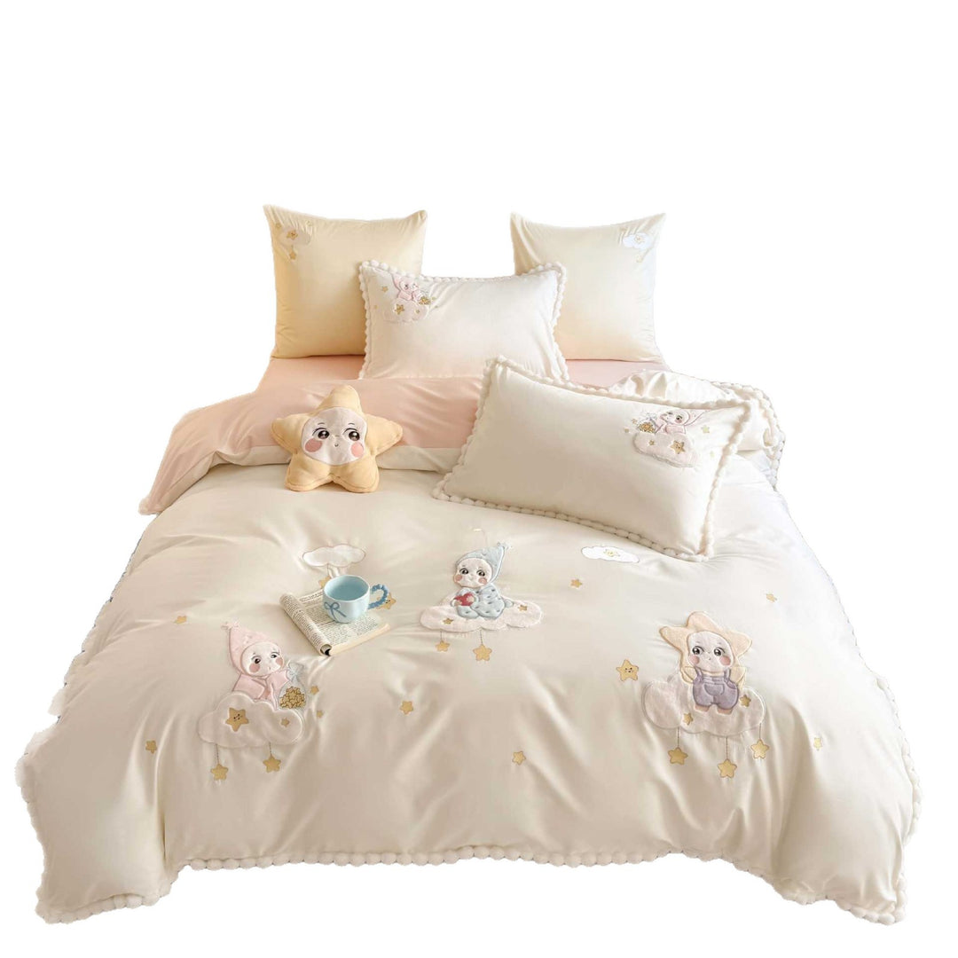 Bedding set for children with stitched cloud and star appliqués