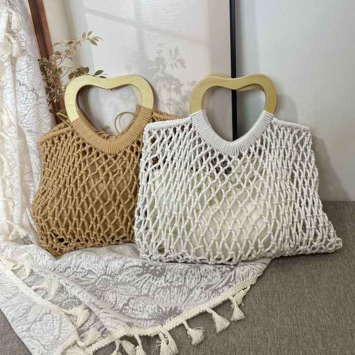 Stylish handbag with heart-shaped handle Kalsten