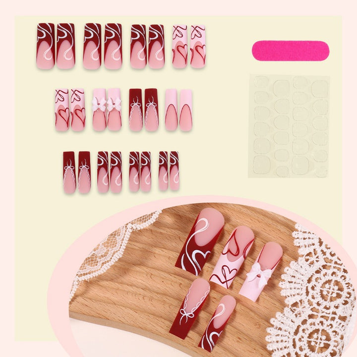 Artificial nail set with romantic heart designs and elegant patterns Kalsten