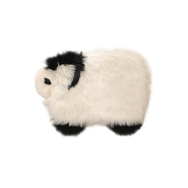 Plush seat pouf in sheep shape with cuddly faux fur cover