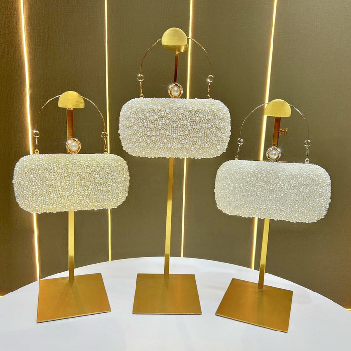Decorative Pearl Clutch with Gold Accents