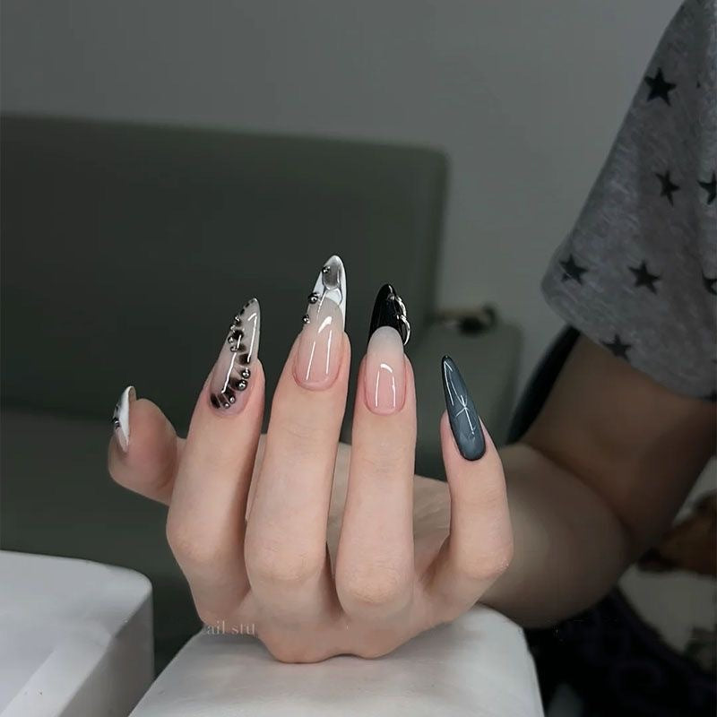 Artistic Oversized Stiletto Nail Enhancements