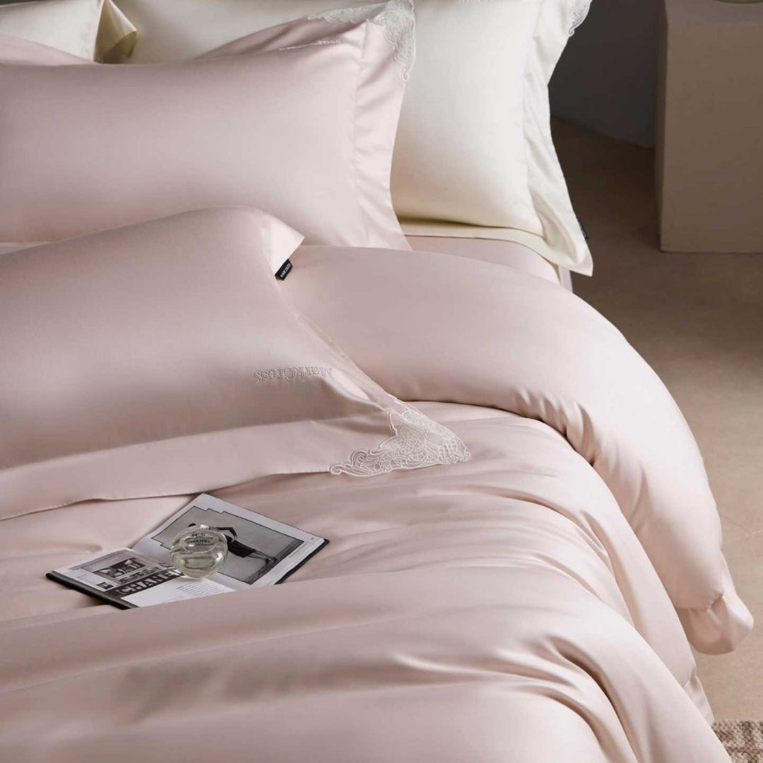 Luxurious cotton satin bedding set with delicate lace trim and hotel finish