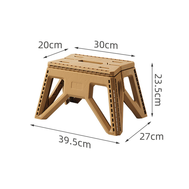Compact foldable step stool made of shatterproof plastic with carrying handle and non-slip feet