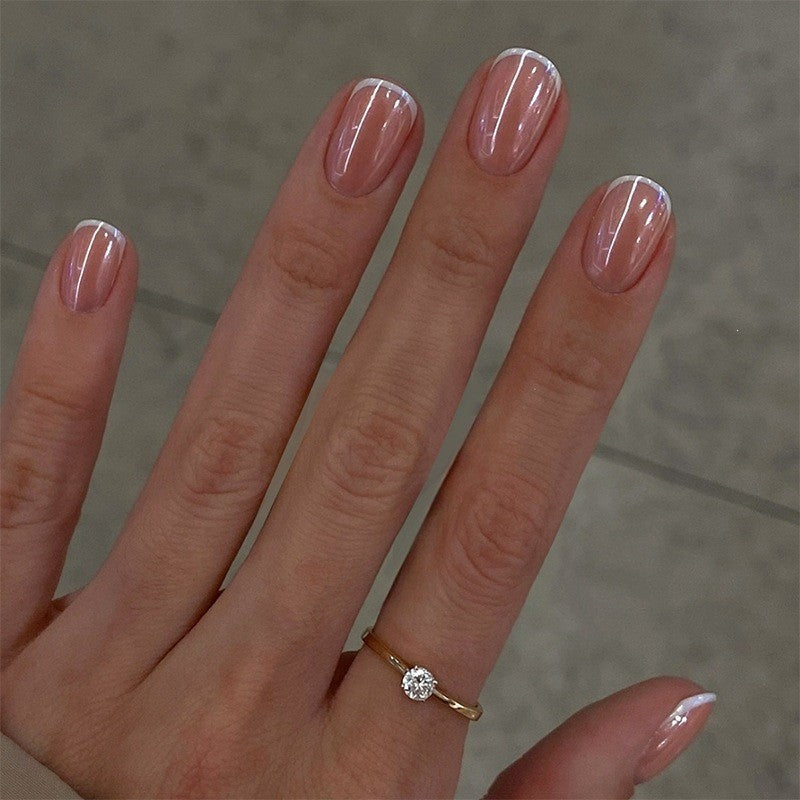 Artificial nail set with elegant high-gloss ombre design and sparkling accents Kalsten