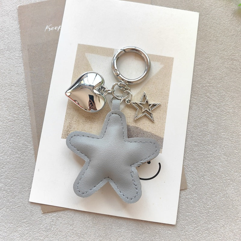 Keychain with star and heart design Kalsten