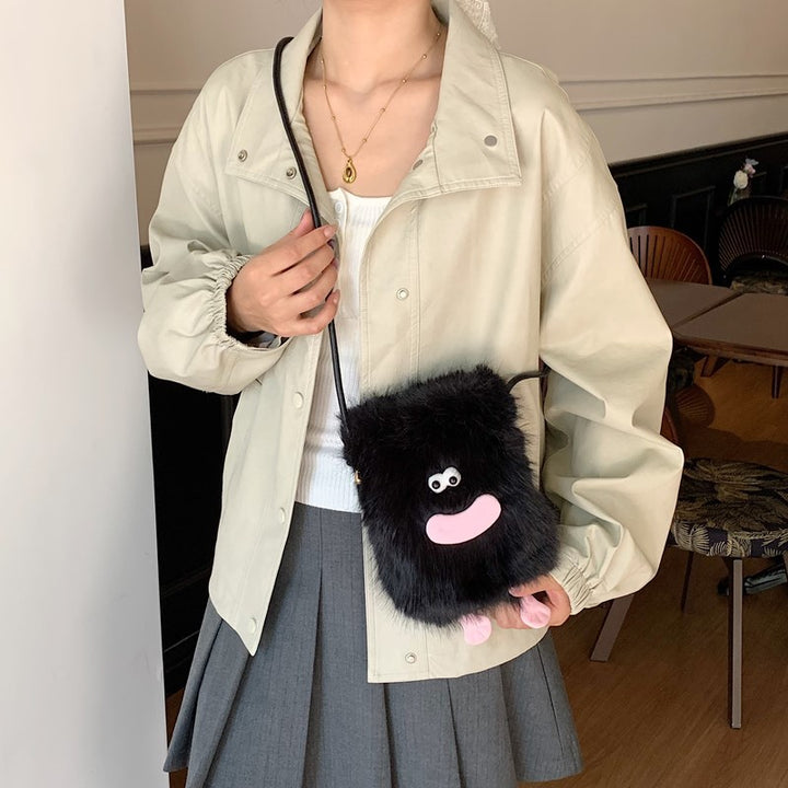 Plush shoulder bag with unique character design Kalsten