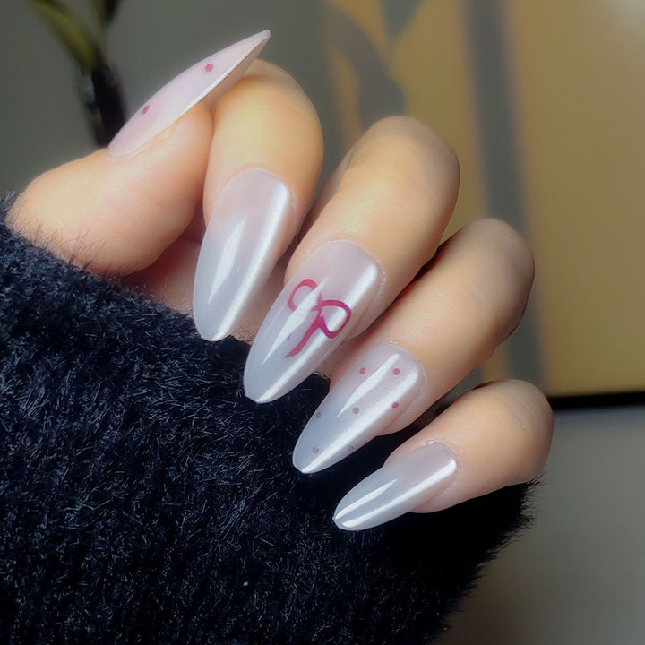 Elegant Stiletto Press-On Nail Art with Minimalist Bow Design