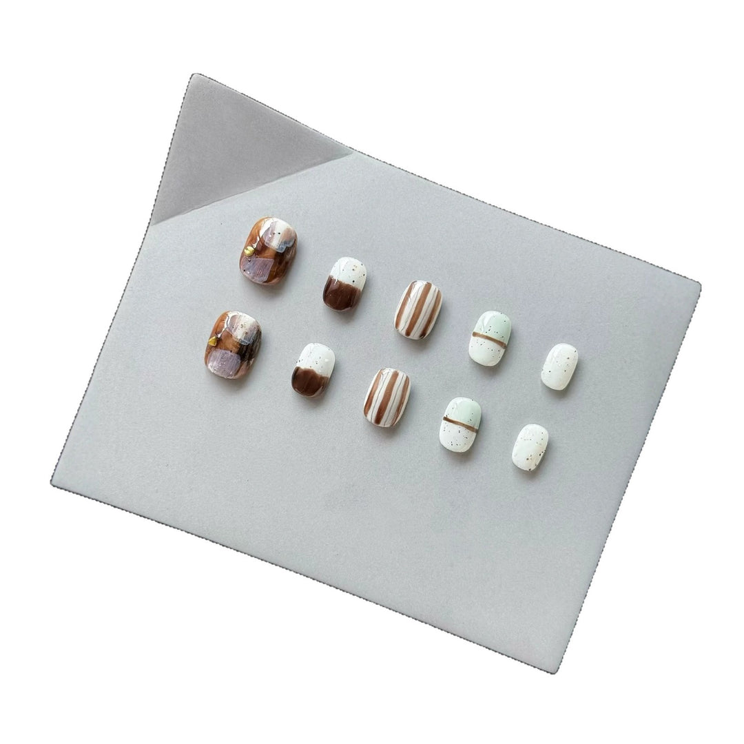 Artistic Press-On Nail Set with Geometric Patterns and Glossy Finish